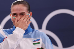 丘索维金娜最后一跳46岁的丘索维金娜含泪告别奥运会